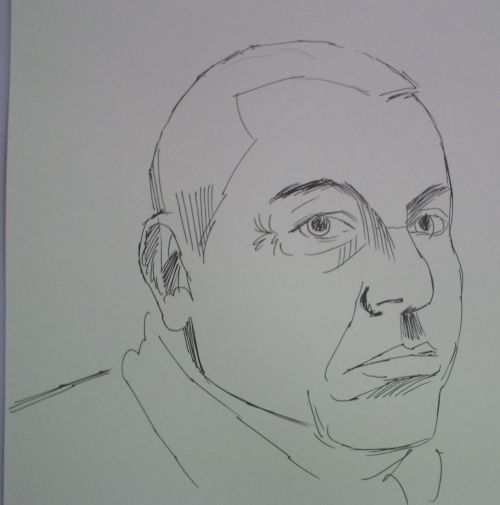 Face sketch of a man in pen